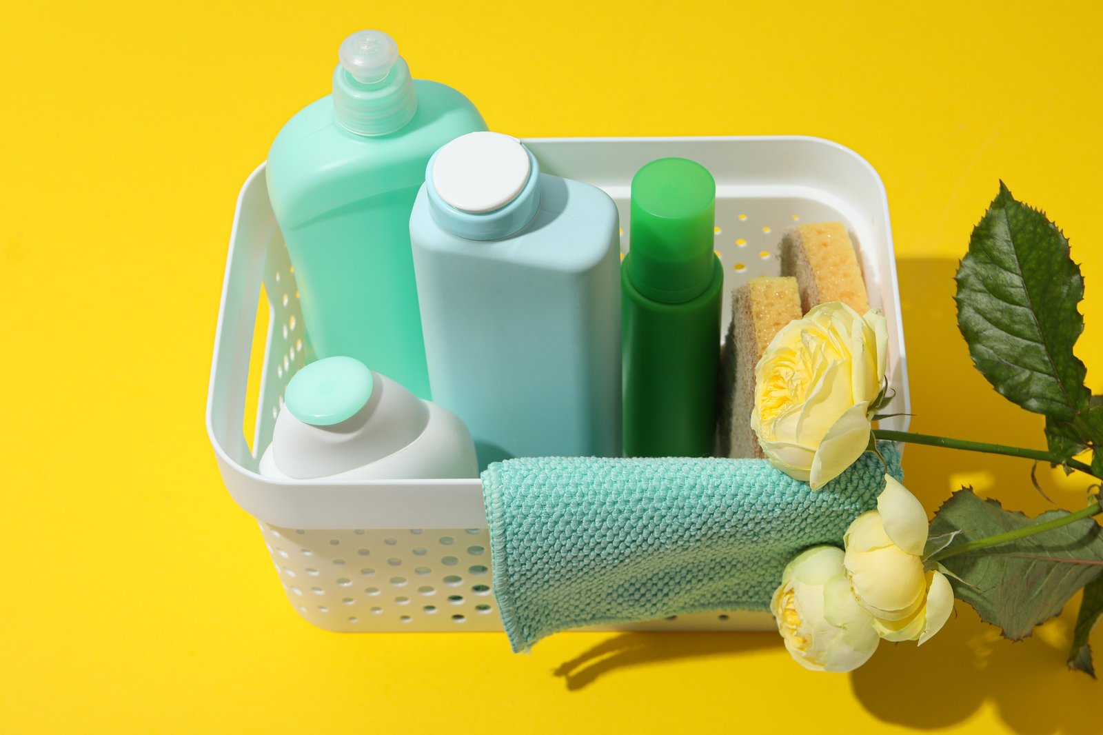 Detergents in a basket on a yellow background